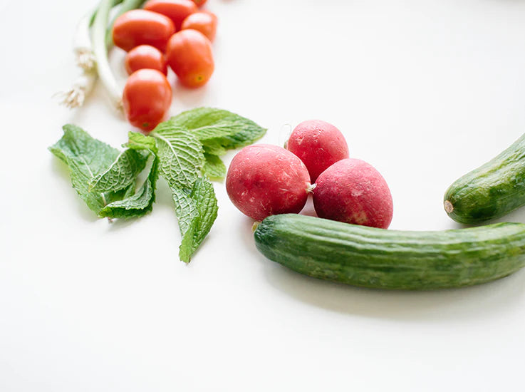 Chef carefully preparing a V+B dish